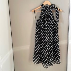 Black and white polka dot halter dress.